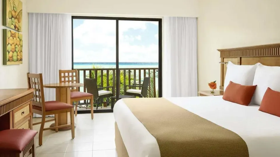 Inside the Premium Partial Ocean View Room at The Reef Coco Beach Resort & Spa — from the hotel's own gallery.