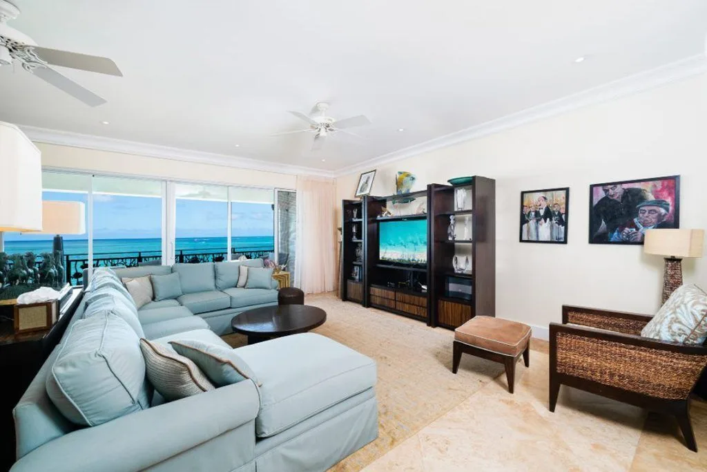 Ocean view living room with sectional sofa at The Regent Grand.