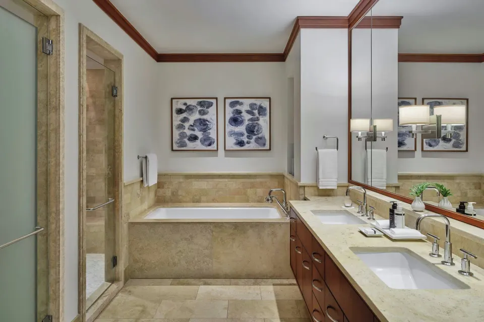 Bathroom with soaking tub and double vanity at The Resort at Kapalua Bay, Maui