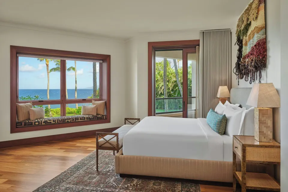 Bedroom with window seat and sea view at The Resort at Kapalua Bay, Maui