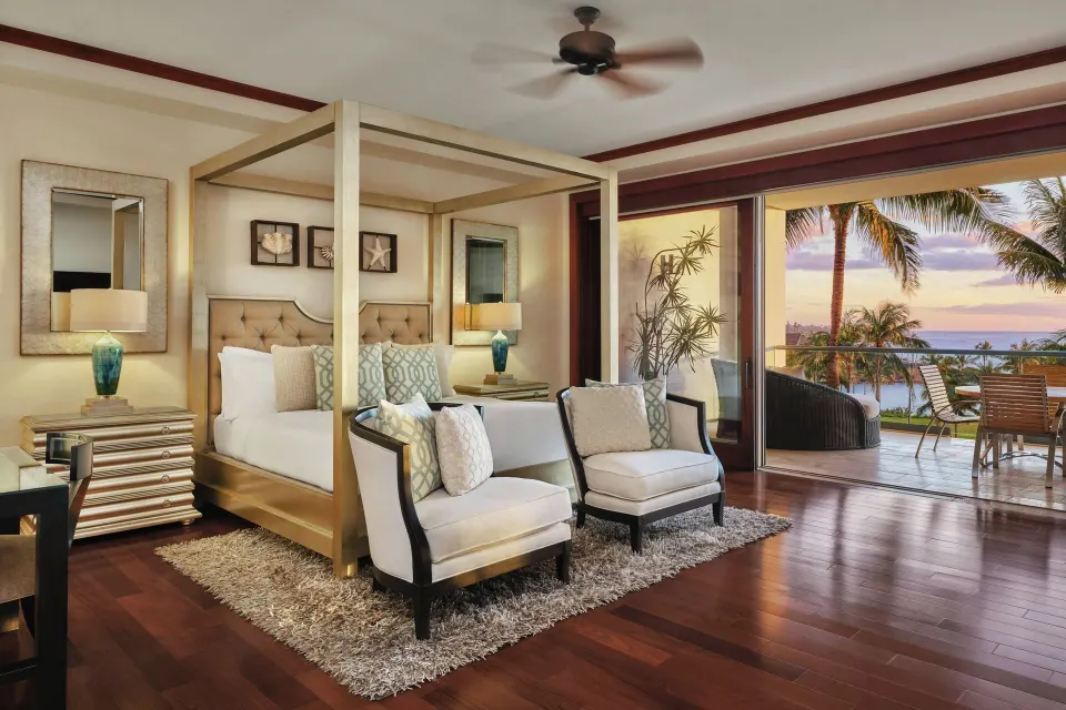 Lanai Four-Bedroom Premier king bedroom with open lanai and sunset view at The Resort at Kapalua Bay, Maui