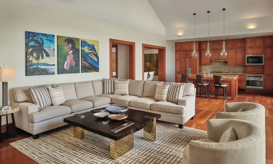Open living room and kitchen with sectional sofa at The Resort at Kapalua Bay, Maui