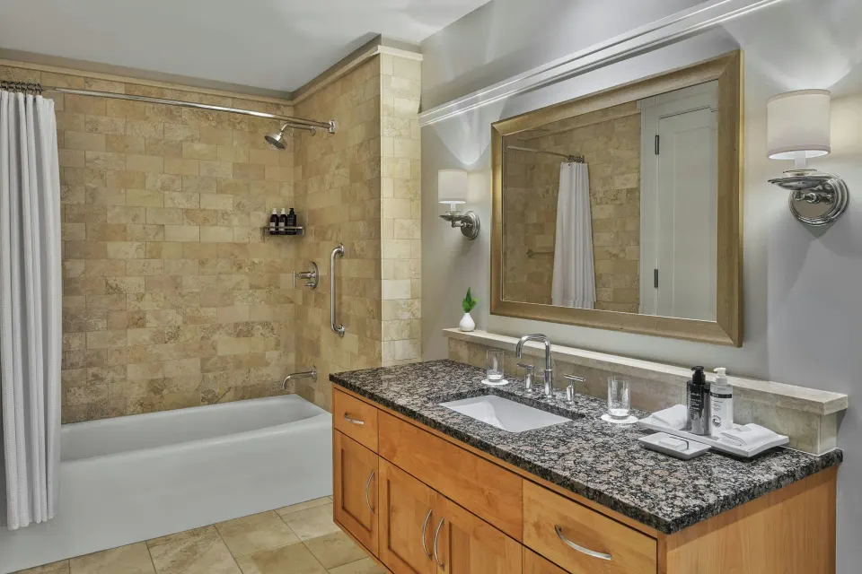 Shower and vanity area in the residence bathroom at The Resort at Kapalua Bay, Maui