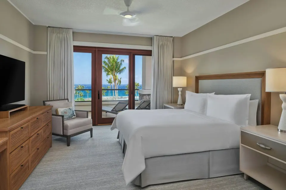 King bed facing lanai and ocean view at The Resort at Kapalua Bay, Maui
