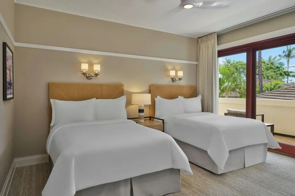 Two-bed guest room with balcony at The Resort at Kapalua Bay, Maui