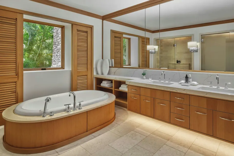 Bathroom with freestanding tub and double vanity in Signature 3 Bedroom Residence at The Resort at Kapalua Bay, Maui