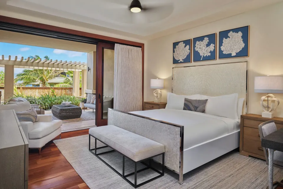 King bedroom opening to garden patio in a Signature 3 Bedroom Residence at The Resort at Kapalua Bay, Maui