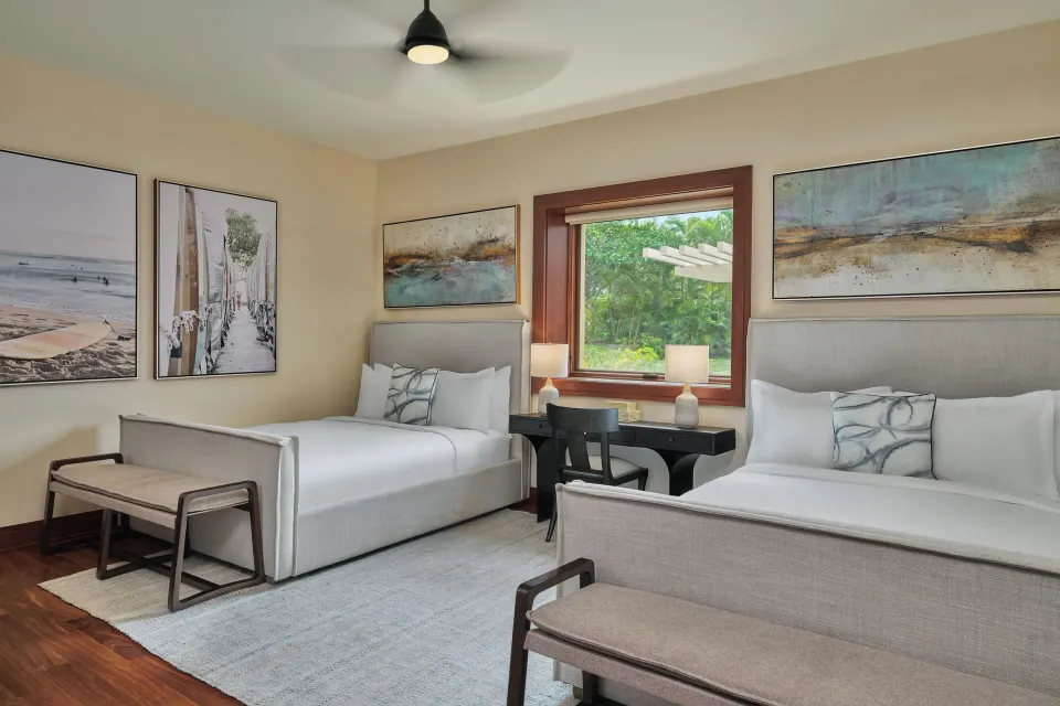 Bedroom with two daybeds and a desk, garden window in a Signature 3 Bedroom Residence at The Resort at Kapalua Bay, Maui