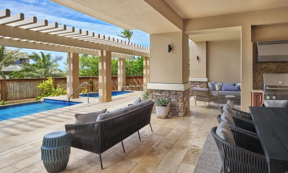 Covered patio with outdoor seating and private plunge pool at The Resort at Kapalua Bay, Maui