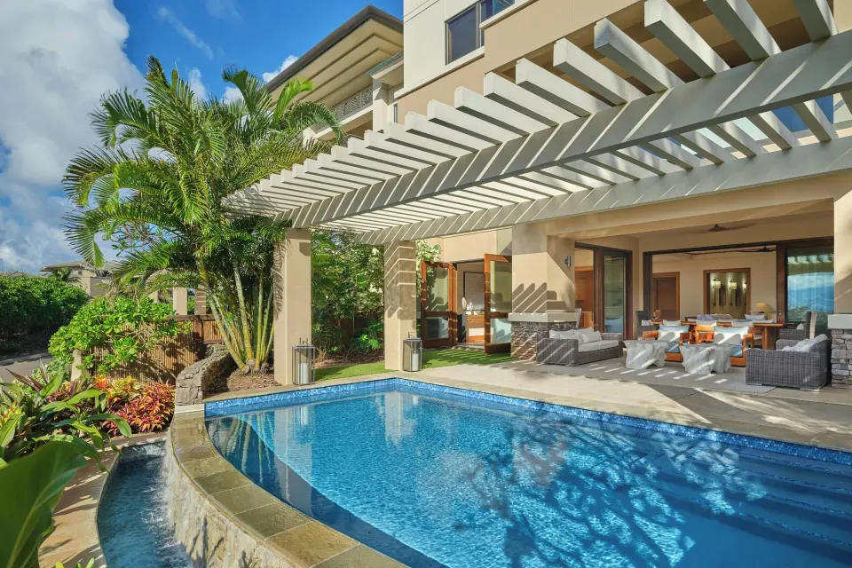 Private plunge pool and covered patio with lounge seating at The Resort at Kapalua Bay, Maui
