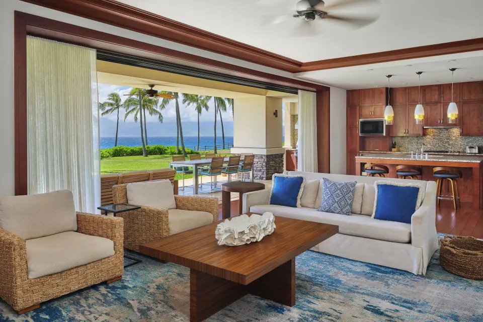 Open-plan living room with ocean view in a Signature 4 Bedroom Residence at The Resort at Kapalua Bay, Maui