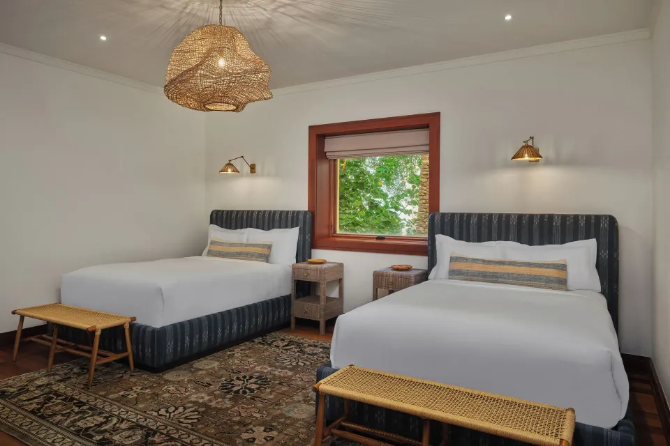 Two double beds in a Signature 4 Bedroom Residence at The Resort at Kapalua Bay, Maui