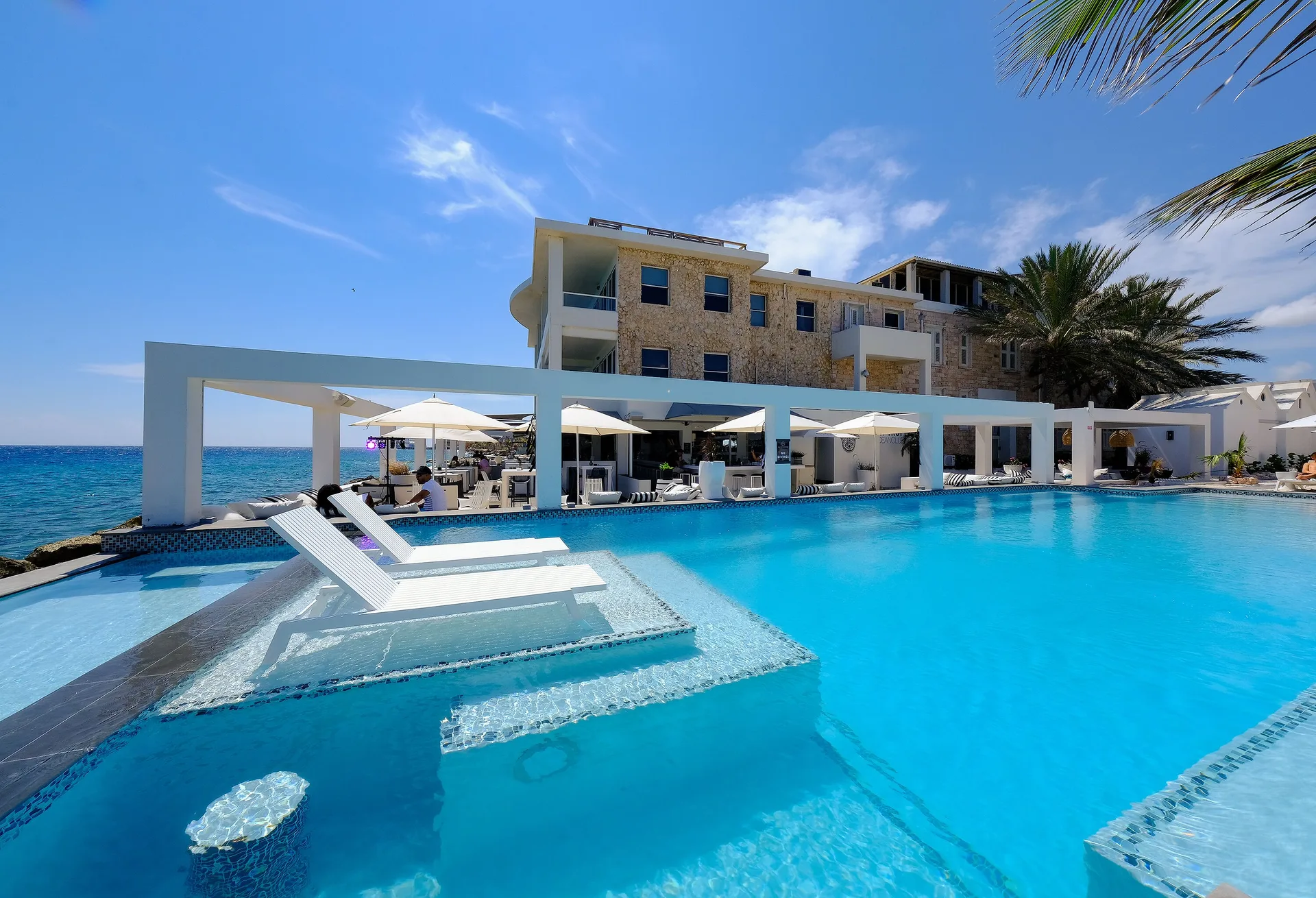 Saint Tropez Boutique Hotel stylish seaside Willemstad hotel with oceanfront pool, dining, and nightlife
