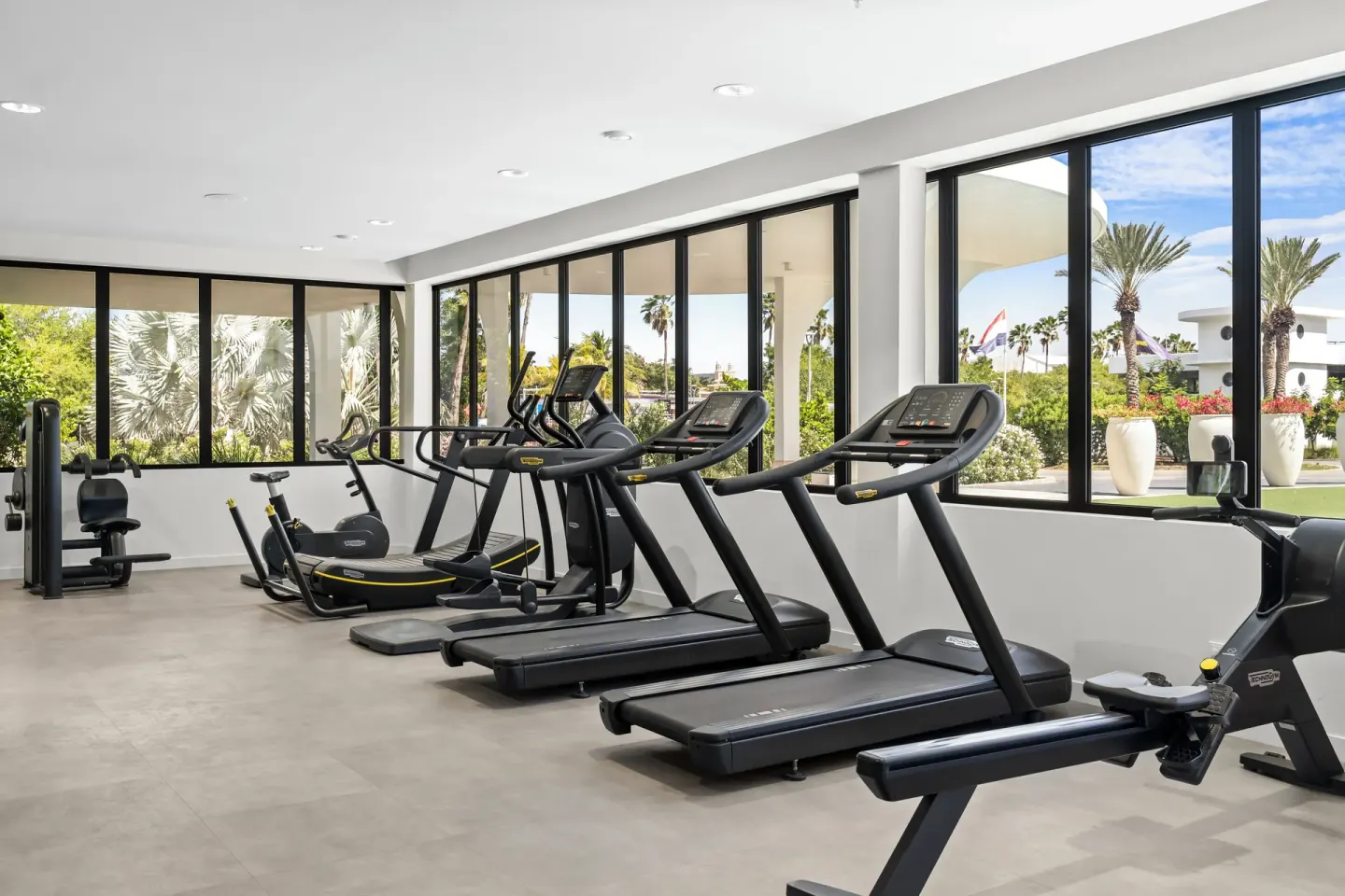 Fitness center treadmills and cardio machines at The Rif at Mangrove Beach Corendon Curacao, Curio.