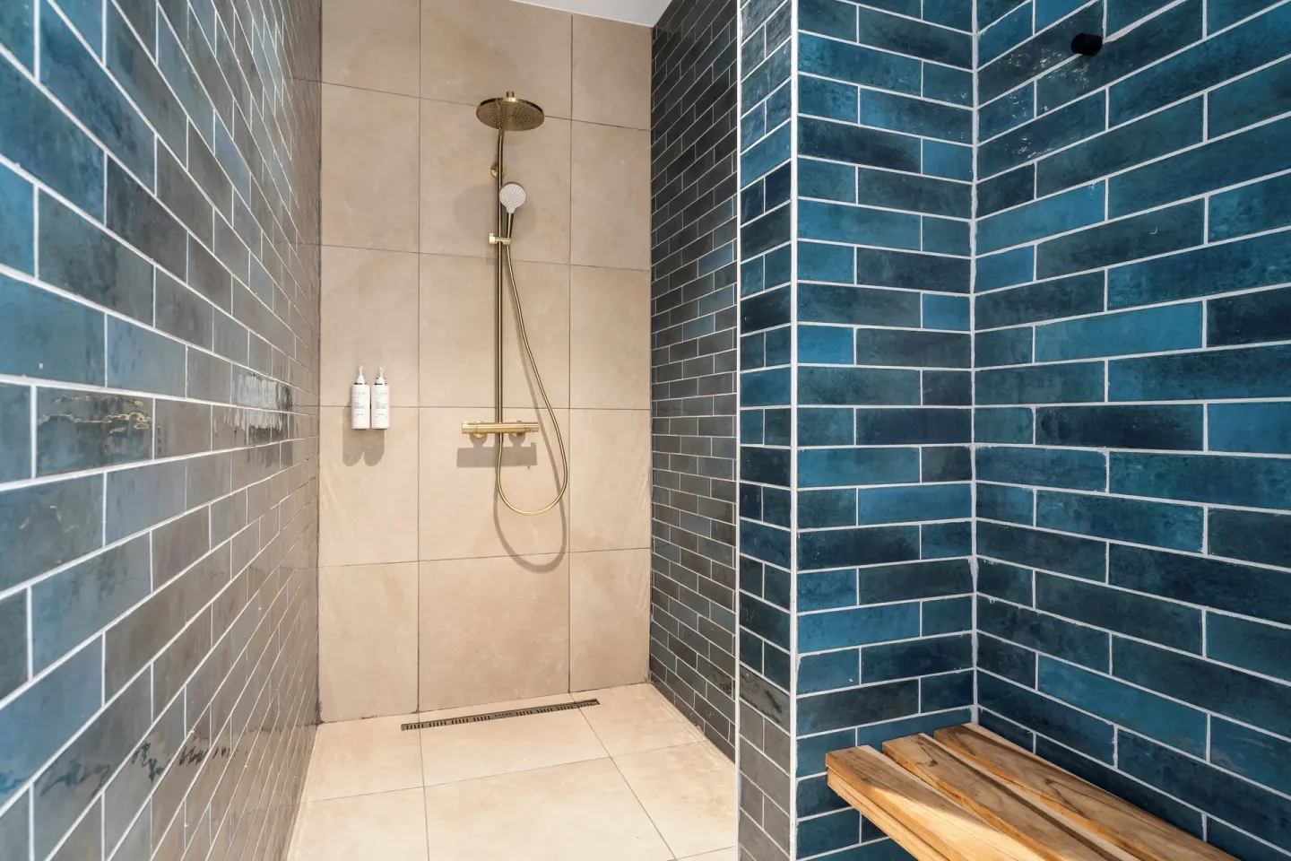 Tiled shower with bench at The Rif at Mangrove Beach Corendon Curacao, Curio.