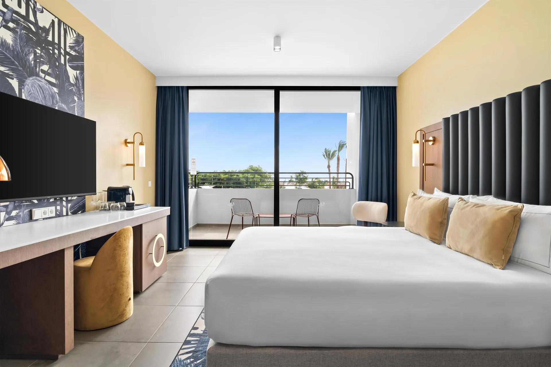 Cruise Ocean View Suite 1 Bedroom at The Rif at Mangrove Beach with king bed, balcony, and Caribbean ocean views in Curaçao.