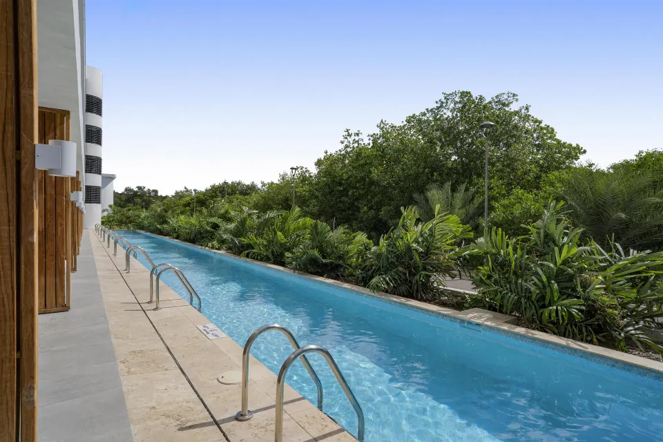 Swim-up pool outside Deluxe Rooms at The Rif at Mangrove Beach Corendon Curacao, Curio.