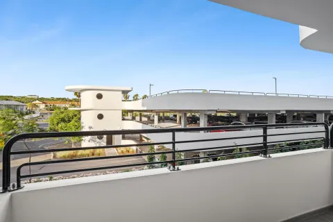 Deluxe Room balcony facing covered parking at The Rif at Mangrove Beach Corendon Curacao, Curio.