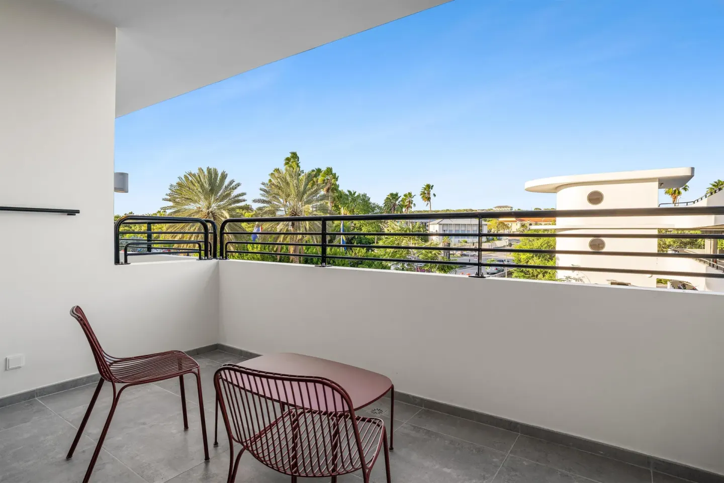 Deluxe Room furnished balcony at The Rif at Mangrove Beach Corendon Curacao, Curio.