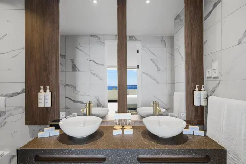 Double vanity bathroom in a Superior Suite at The Rif at Mangrove Beach Corendon Curacao, Curio.