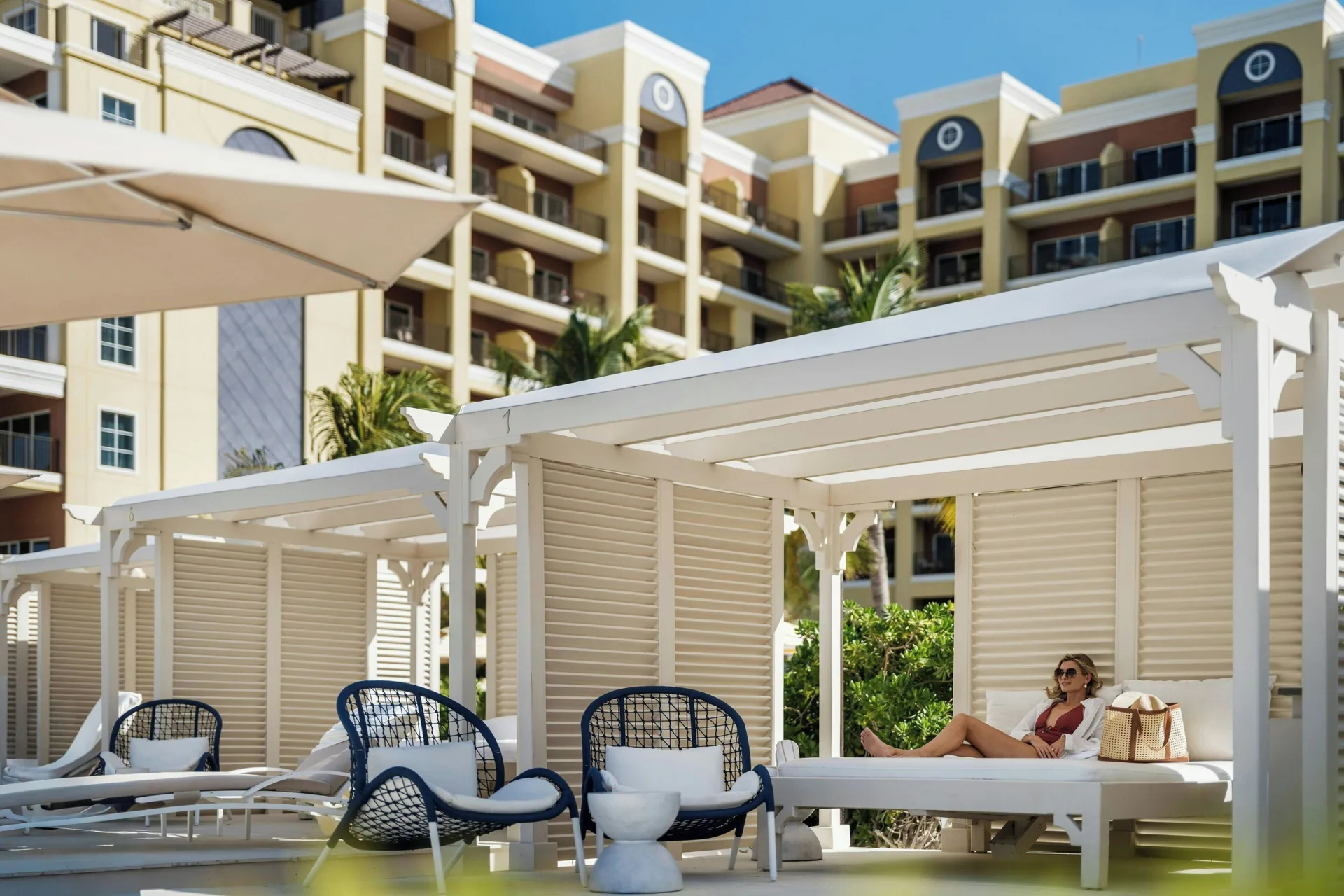 Poolside cabana with lounge seating at The Ritz-Carlton, Aruba.