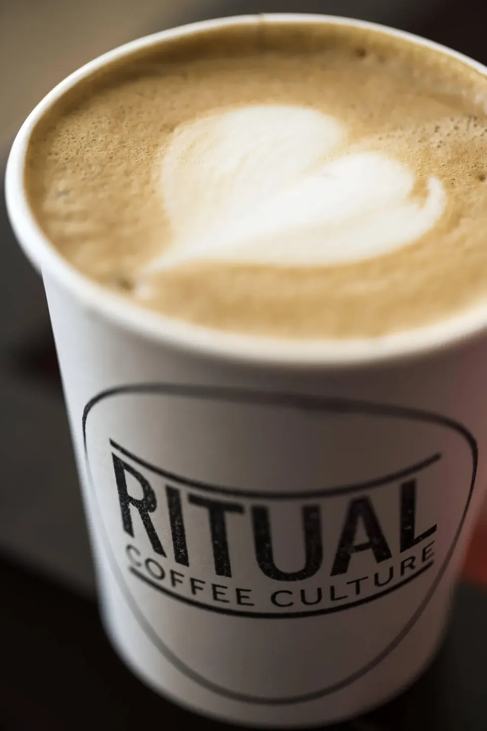 Latte with heart-shaped foam art at Ritual Coffee Culture at The Ritz-Carlton, Aruba.