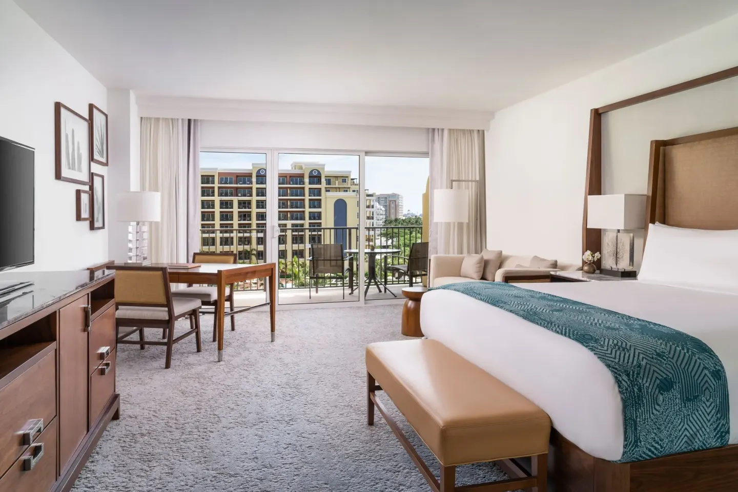 Coastline View guest room with king bed and balcony at The Ritz-Carlton, Aruba.