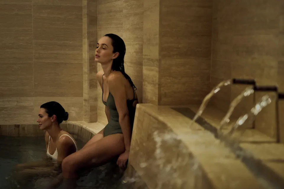 Indoor spa pool with water features at The Ritz-Carlton, Grand Cayman.