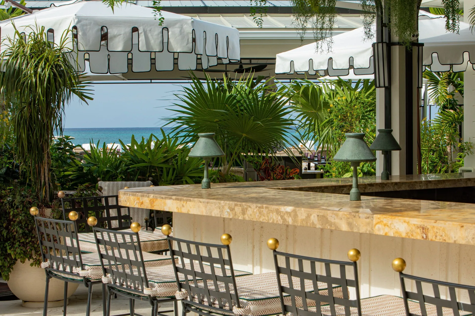 Outdoor bar with ocean views at The Ritz-Carlton, Grand Cayman.