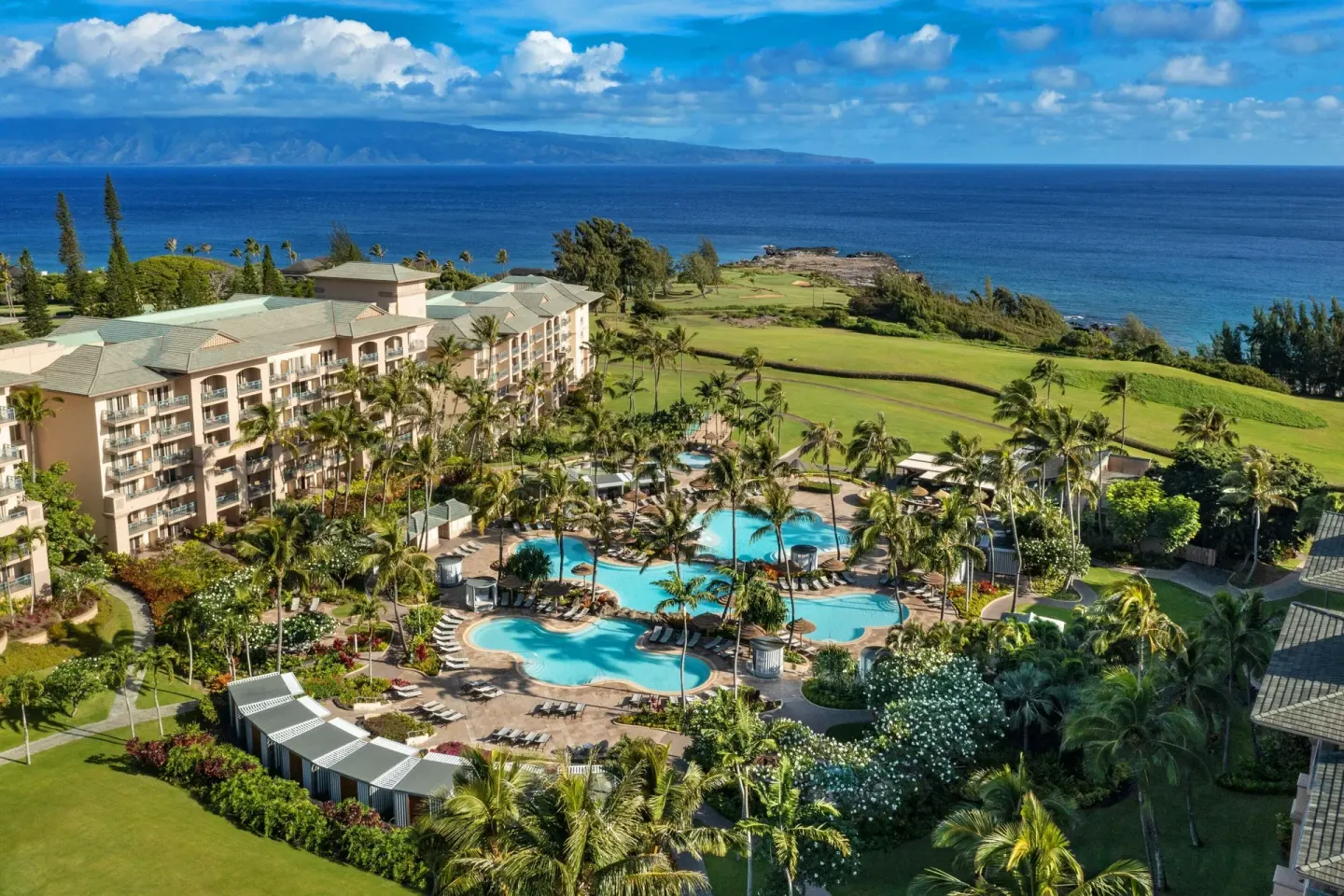 Aerial view of the resort pools and ocean at The Ritz-Carlton Maui, Kapalua.