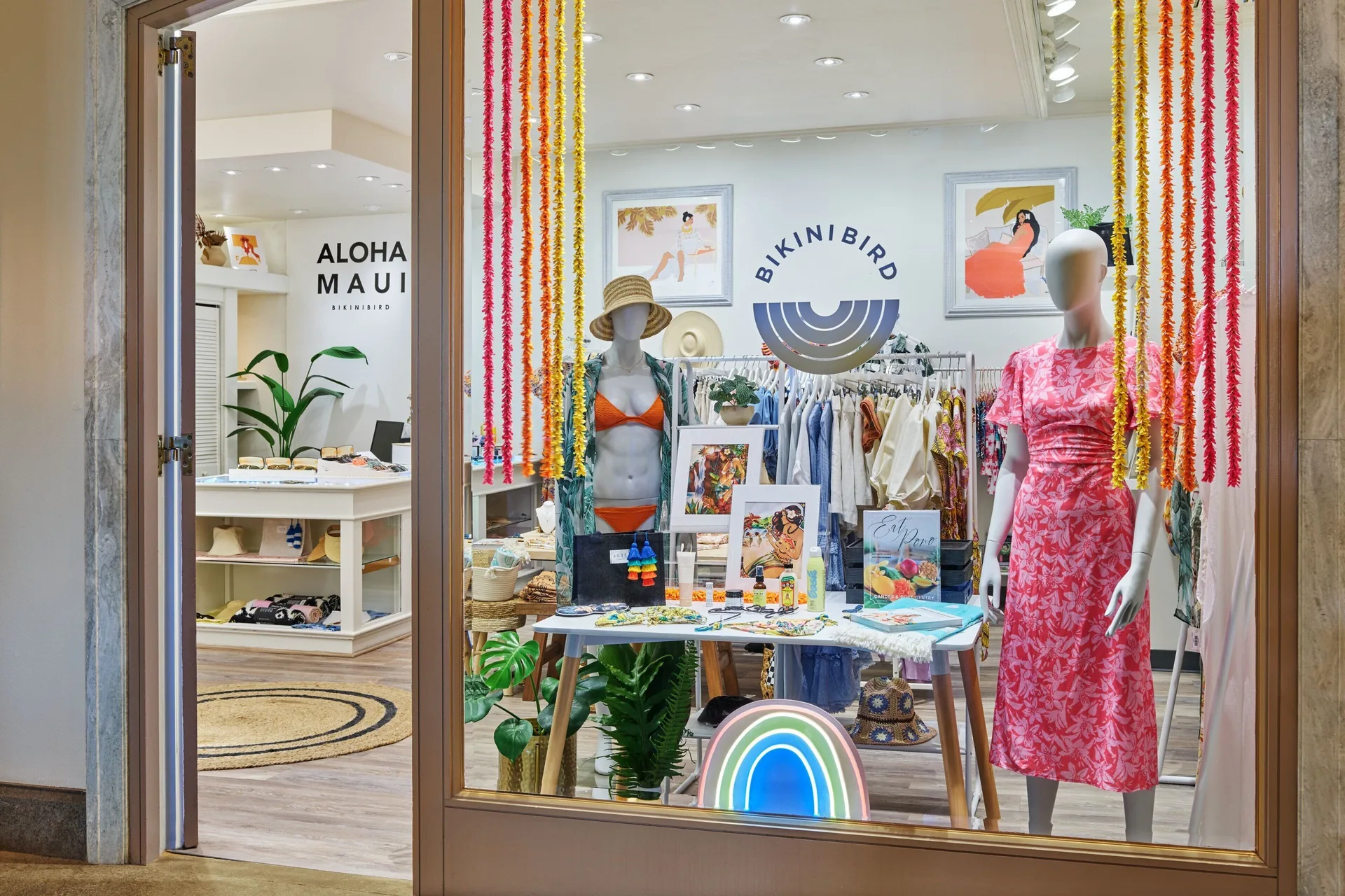 Boutique window display with resort apparel at The Ritz-Carlton Maui, Kapalua.