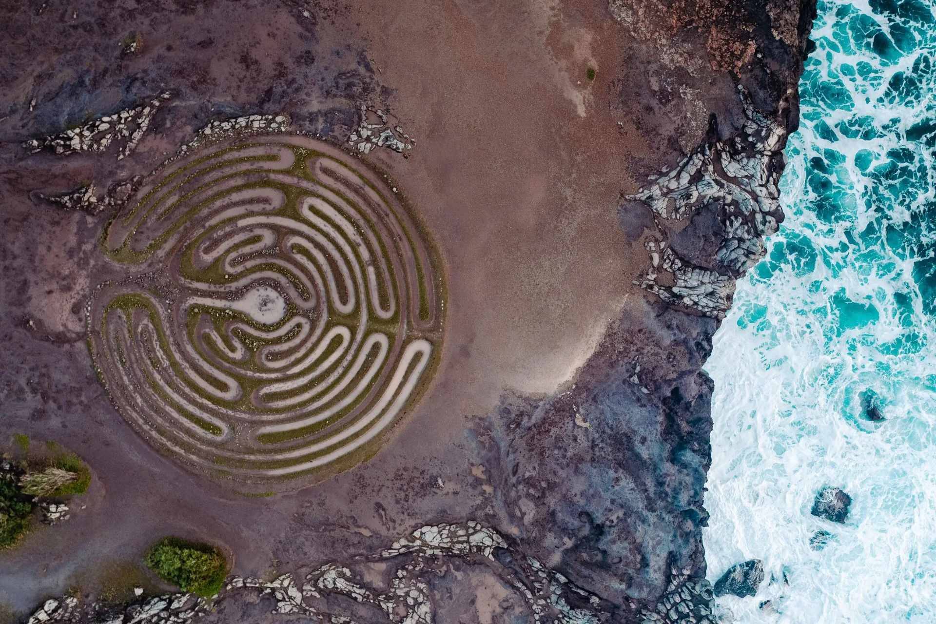 Aerial view of a coastal labyrinth near The Ritz-Carlton Maui, Kapalua.