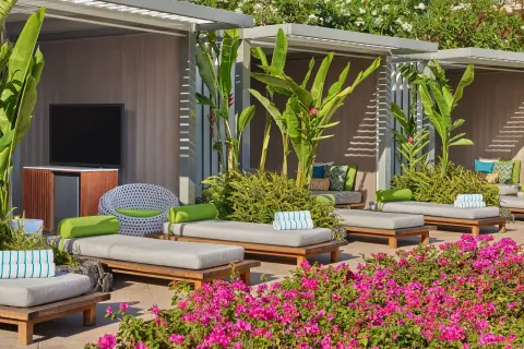 Poolside cabanas and daybeds at The Ritz-Carlton Maui, Kapalua.