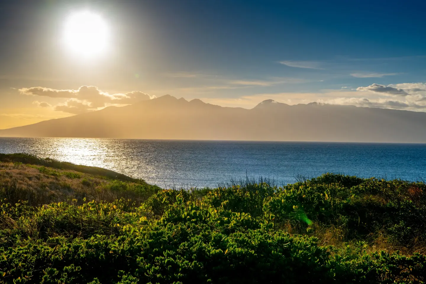 Ocean and island scenery at sunset near The Ritz-Carlton Maui, Kapalua.