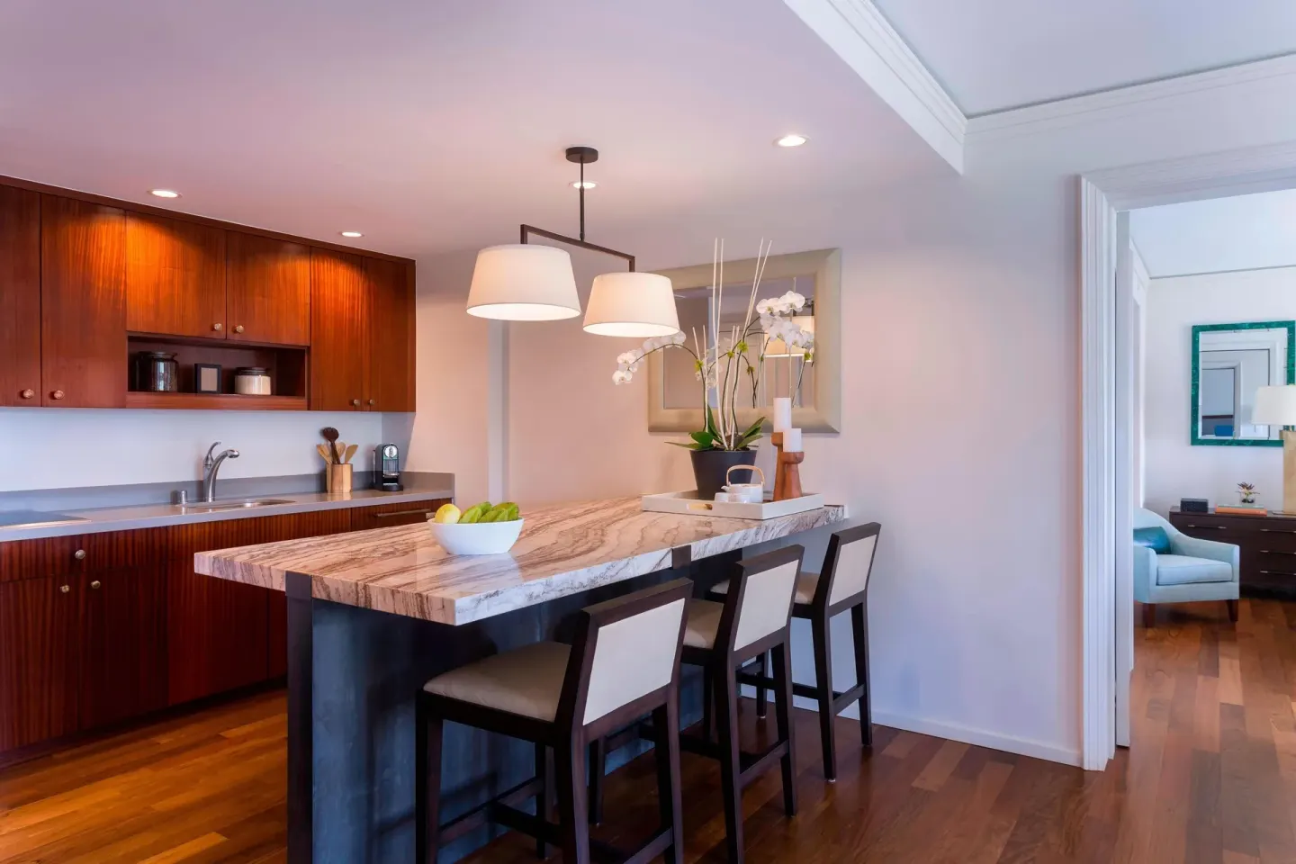 Residential suite kitchen and island at The Ritz-Carlton Maui, Kapalua.