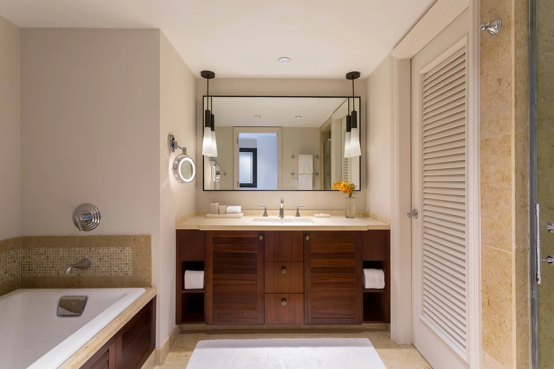 Club Room bathroom vanity and tub at The Ritz-Carlton Maui, Kapalua.