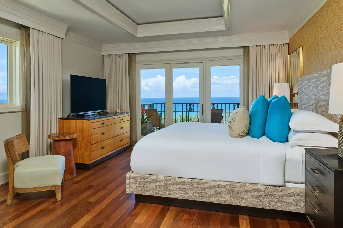 Club Room king bed with balcony and ocean view at The Ritz-Carlton Maui, Kapalua.