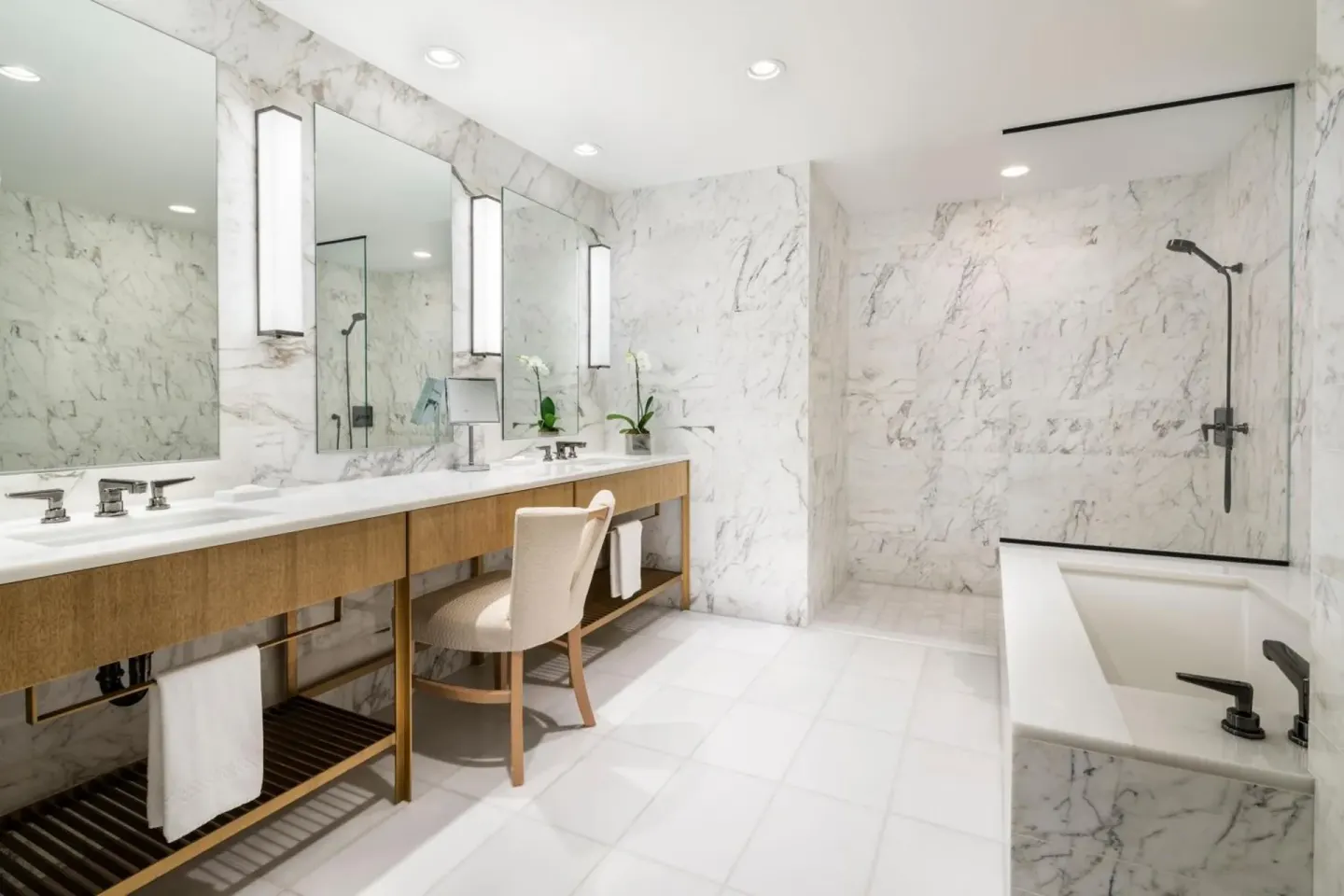 Marble bathroom with double vanity at The Ritz-Carlton Residences, Waikiki Beach.