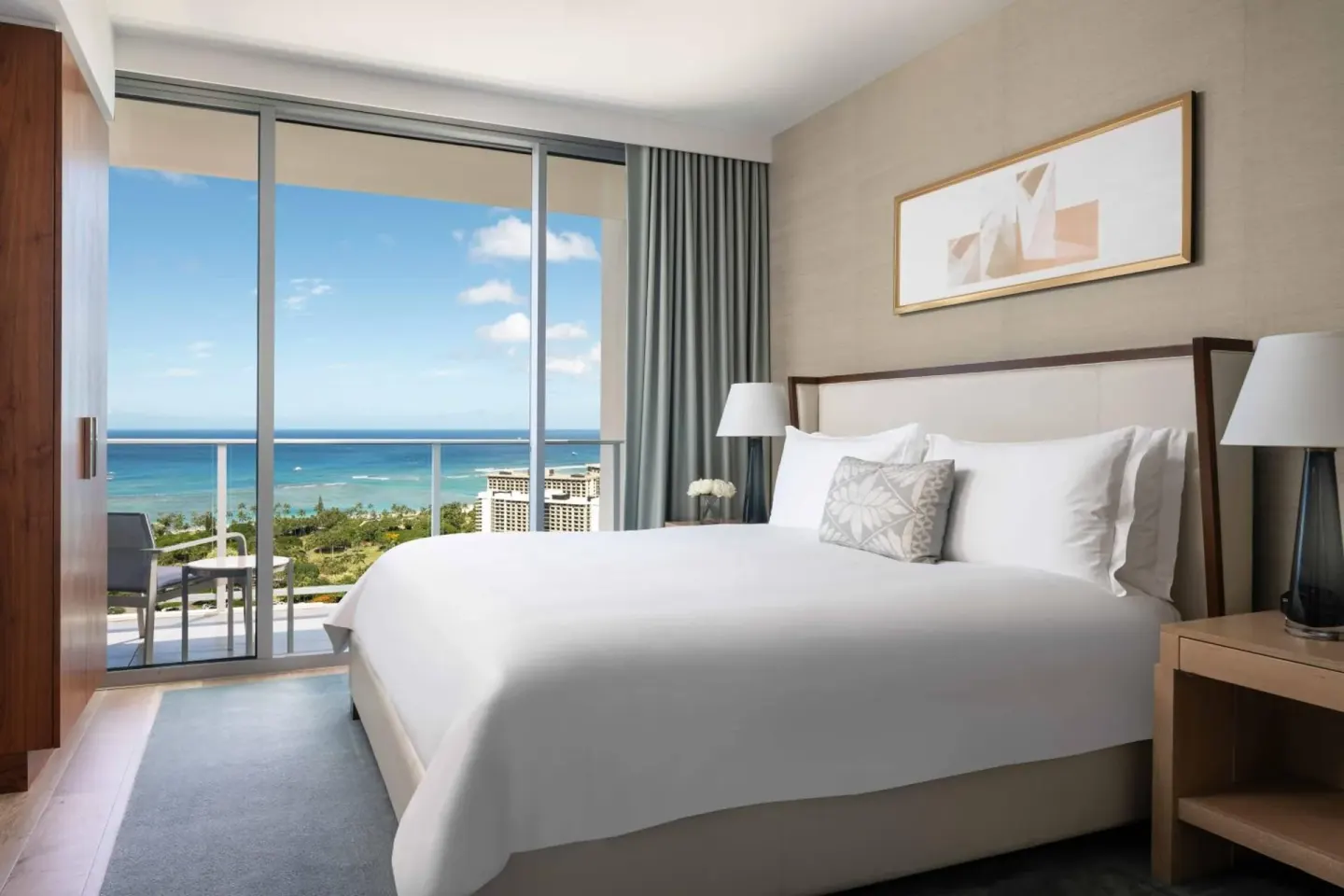 Ocean-view king bedroom at The Ritz-Carlton Residences, Waikiki Beach.