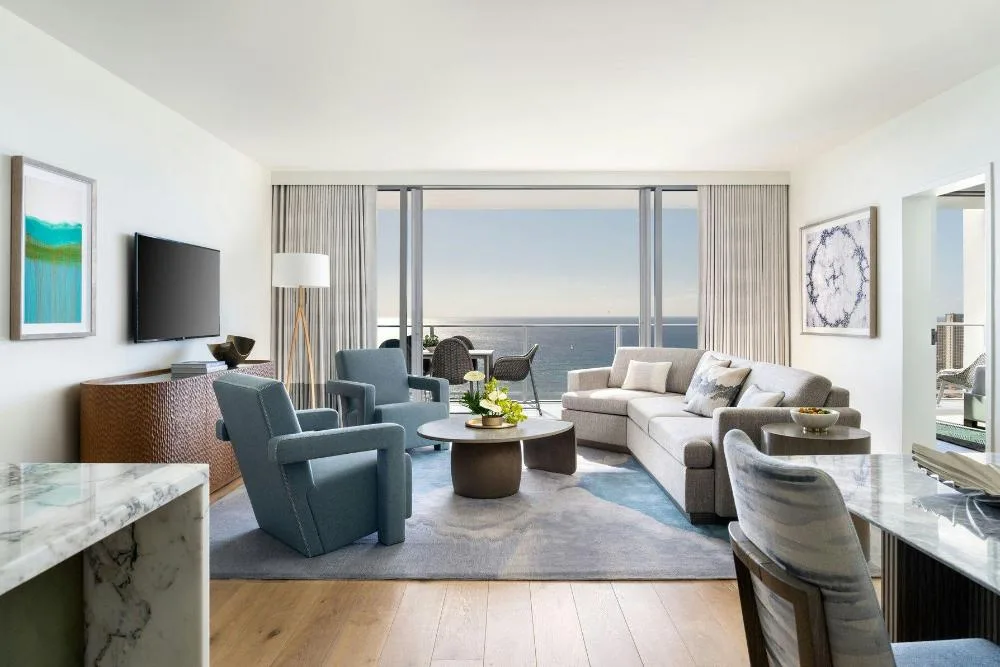 Ocean-view living room in a 3-bedroom suite at The Ritz-Carlton Residences, Waikiki Beach.