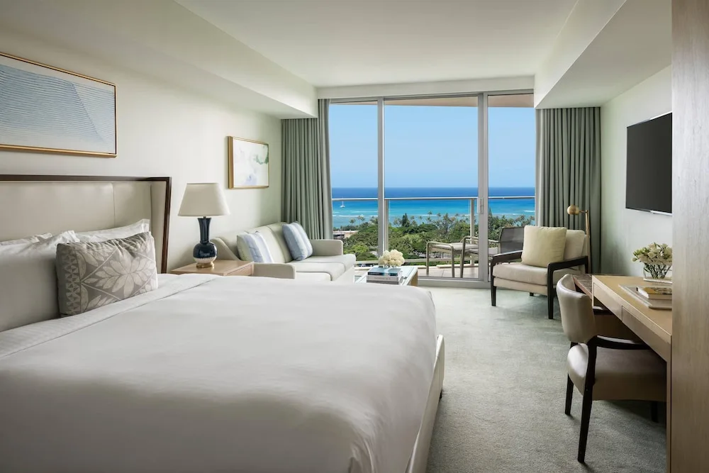 Ocean view room with king bed and sofa bed at The Ritz-Carlton Residences, Waikiki Beach.