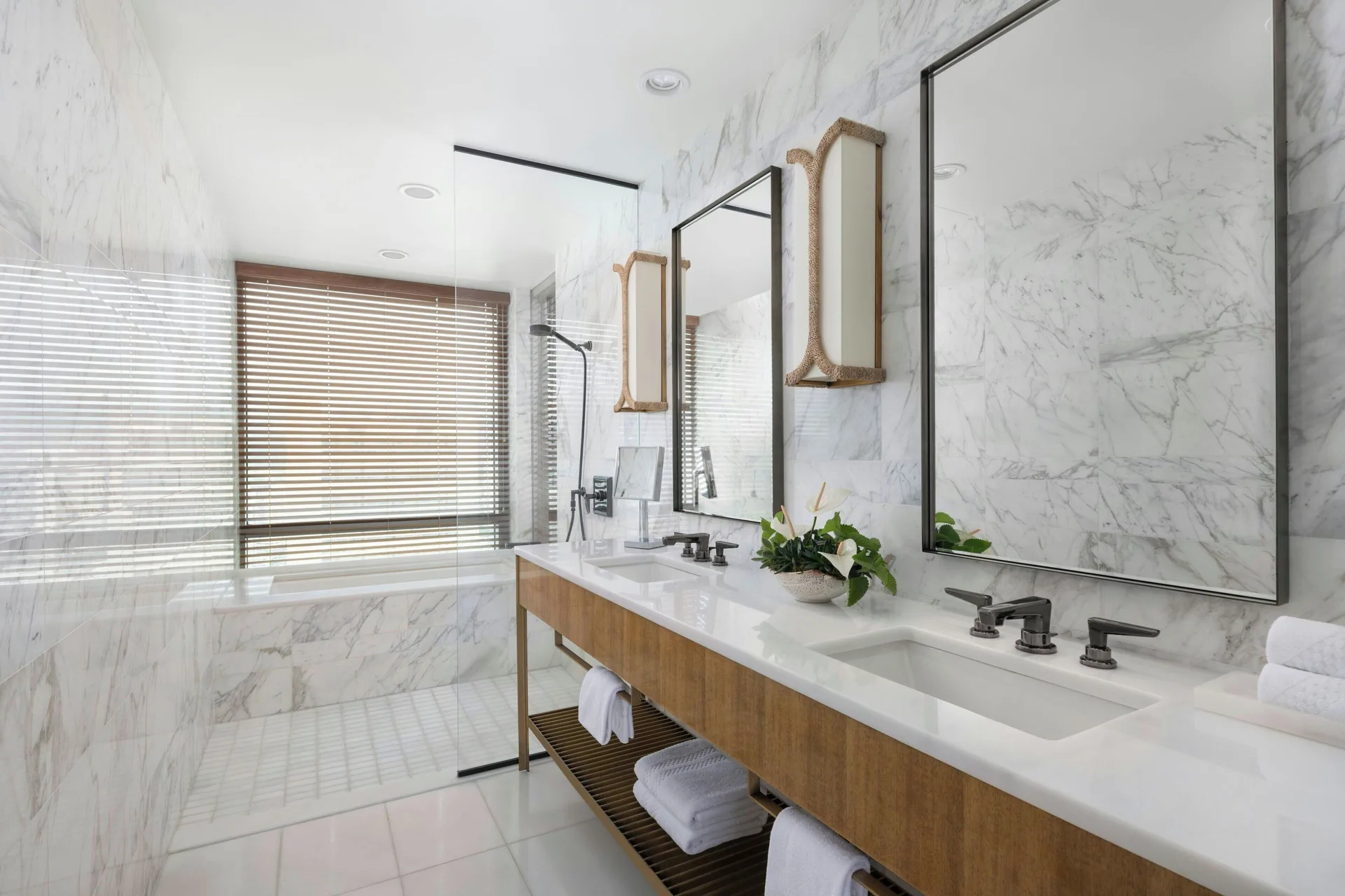Sky Three-Bedroom Suite marble bathroom with double vanity at The Ritz-Carlton Residences, Waikiki Beach.