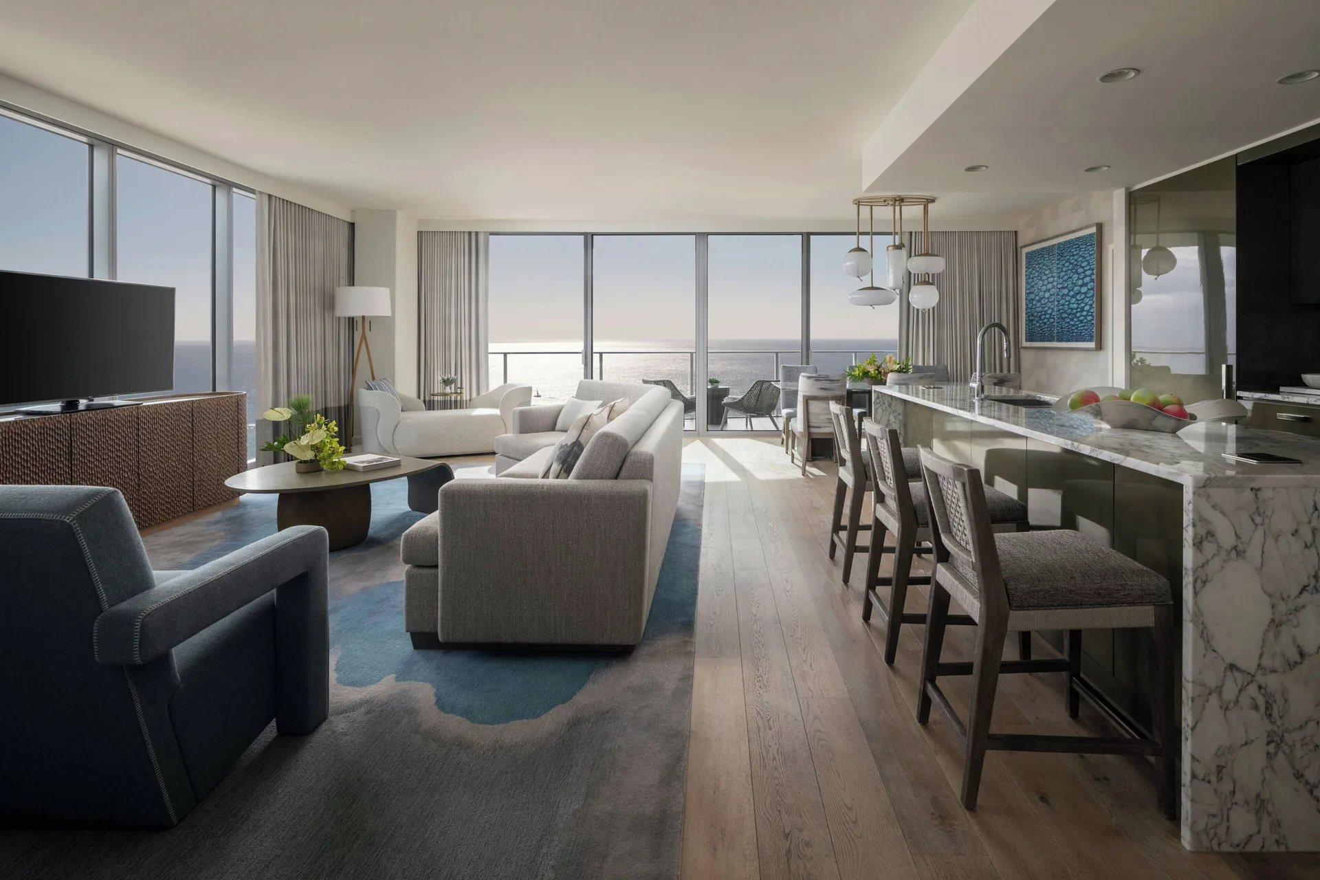 Sky Three-Bedroom Suite living and kitchen area at The Ritz-Carlton Residences, Waikiki Beach.