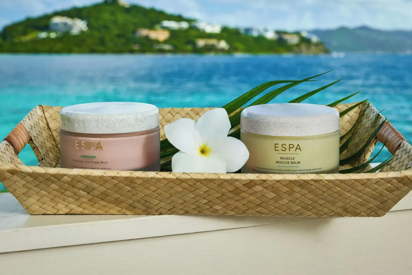 Spa products in a woven tray by the water at The Ritz-Carlton, St. Thomas.