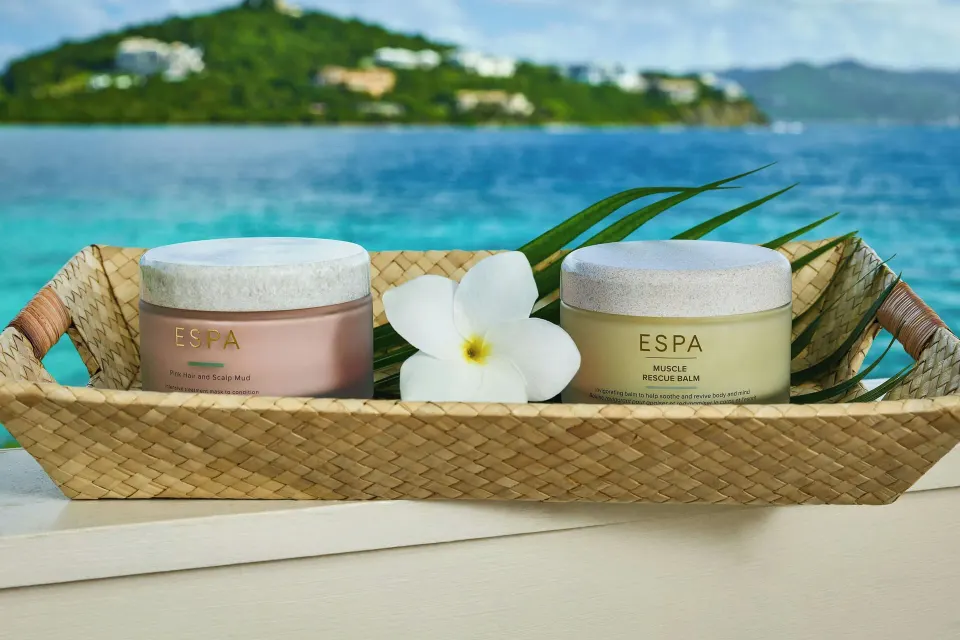 Spa products in a woven tray by the water at The Ritz-Carlton, St. Thomas.