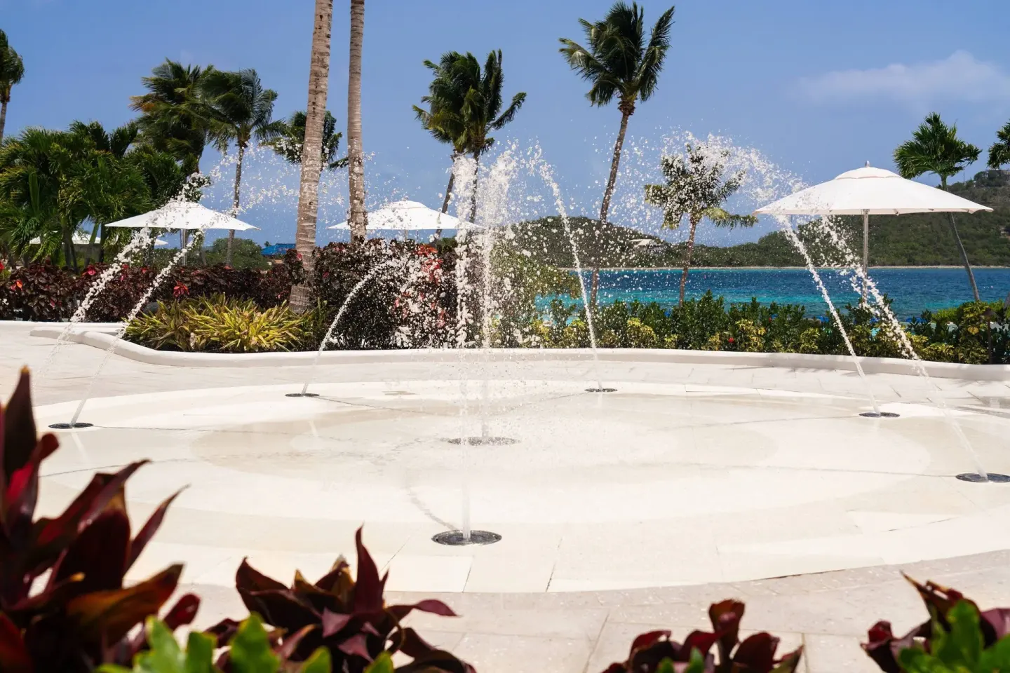 Splash pad with ocean backdrop at The Ritz-Carlton, St. Thomas.