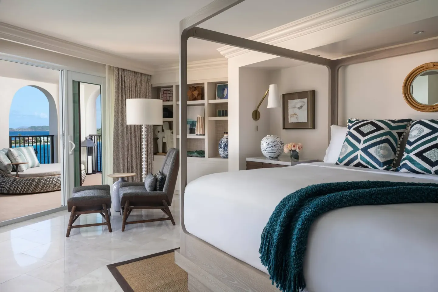 Presidential 1 Bedroom Suite king bedroom at The Ritz-Carlton, St. Thomas opening to a terrace.