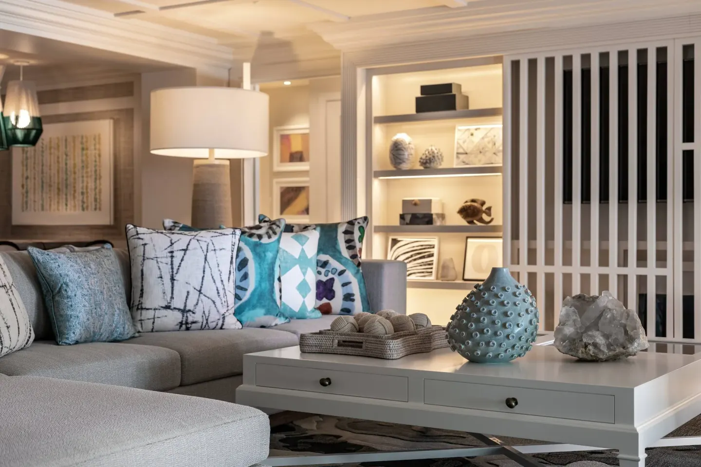Presidential 1 Bedroom Suite seating area at The Ritz-Carlton, St. Thomas with pillows and coffee table.