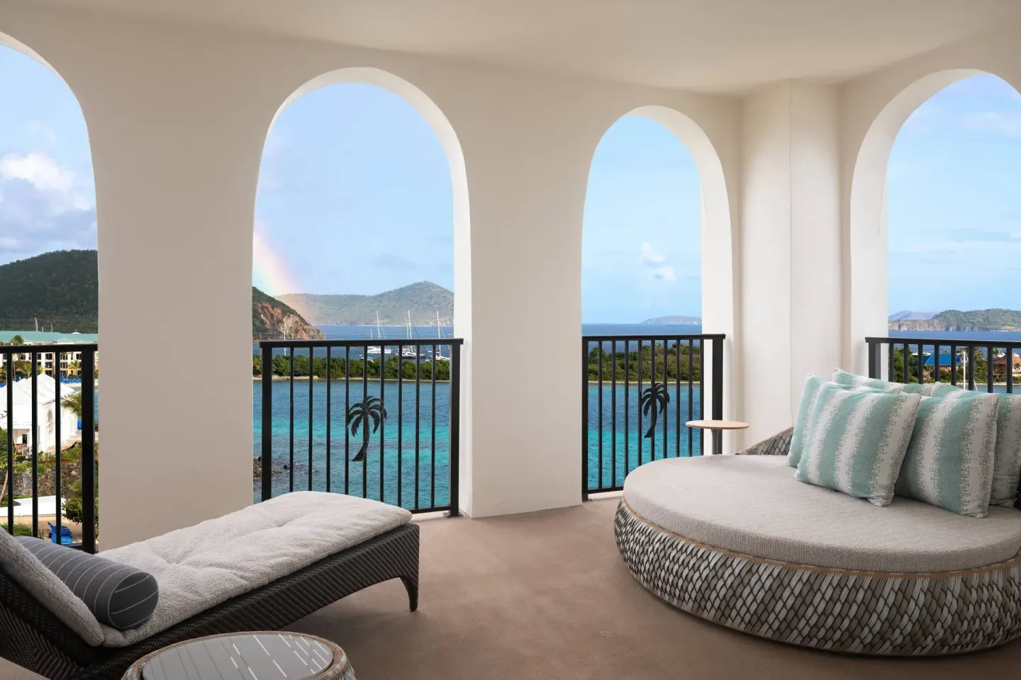 Presidential 1 Bedroom Suite terrace daybed at The Ritz-Carlton, St. Thomas with bay views.