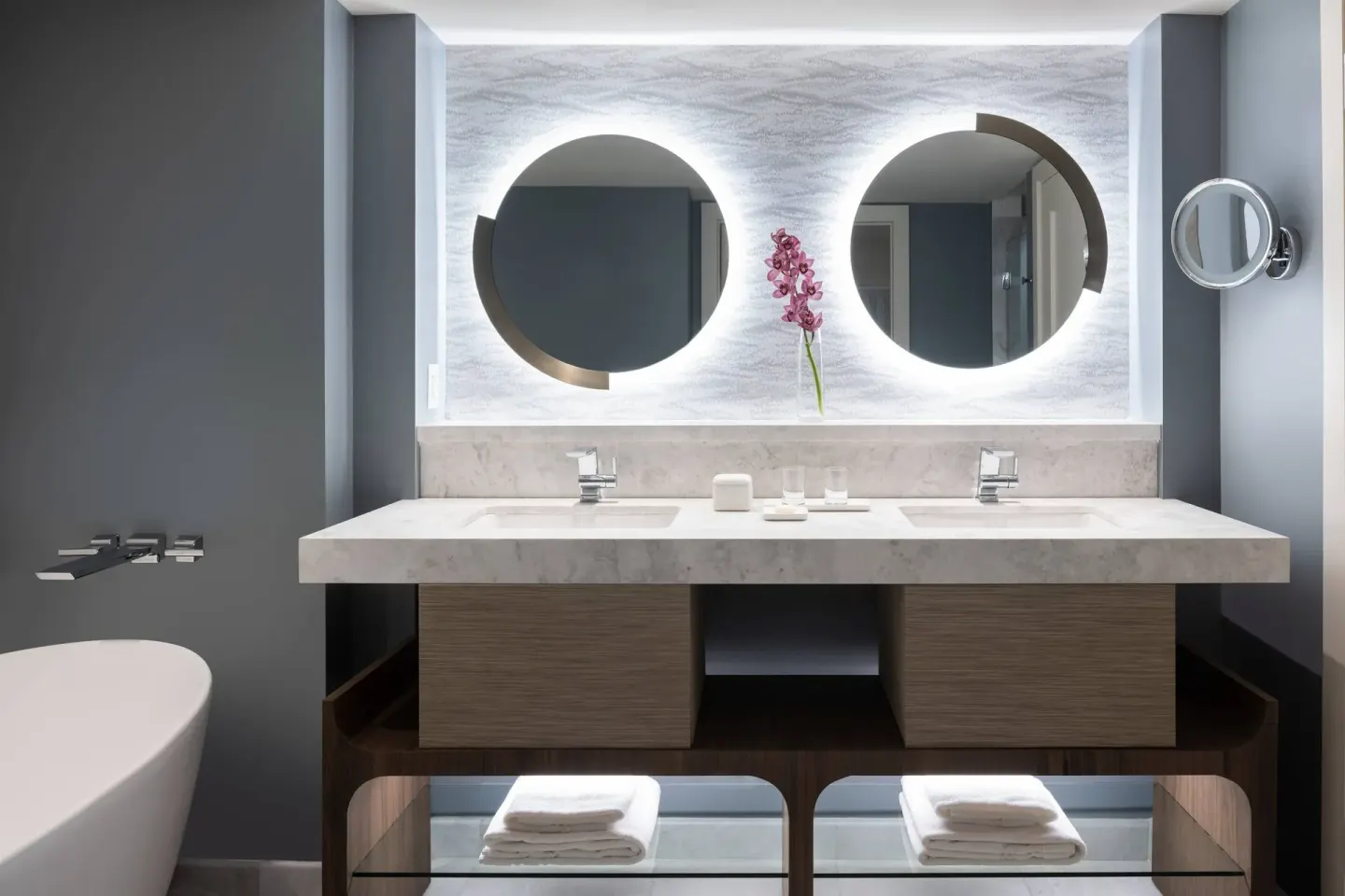 Resort View Room double vanity with round mirrors at The Ritz-Carlton, St. Thomas.
